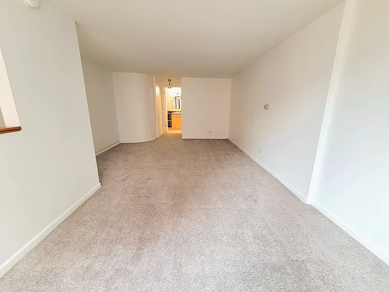 Large bedroom that will easily fit a king size bed, a home office, and will still have room to spare.