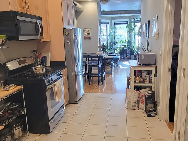 Open kitchen viewing dining and living rooms.