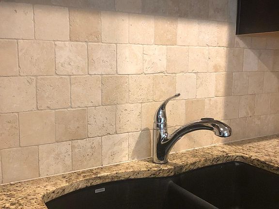 Deep kitchen sink with double bowl.