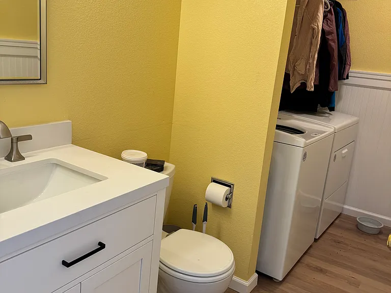 Half bath - laundry room. Washer and dryer included.