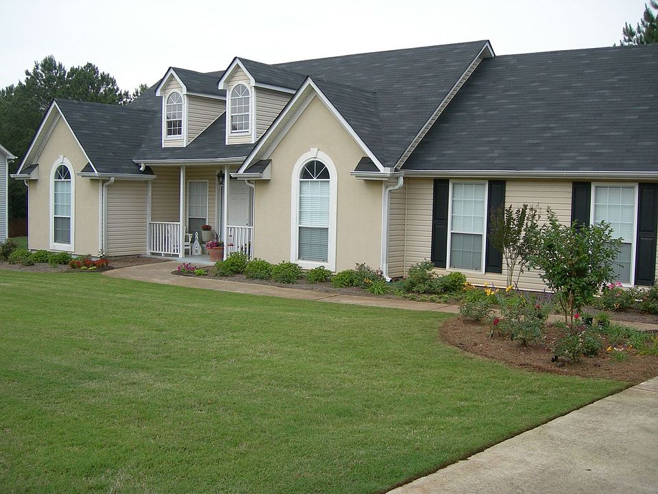 Beautifully Landscaped Front View