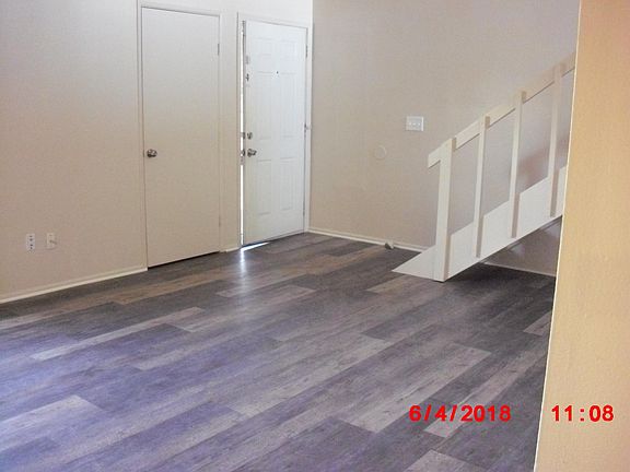 Living room with new flooring and fresh paint