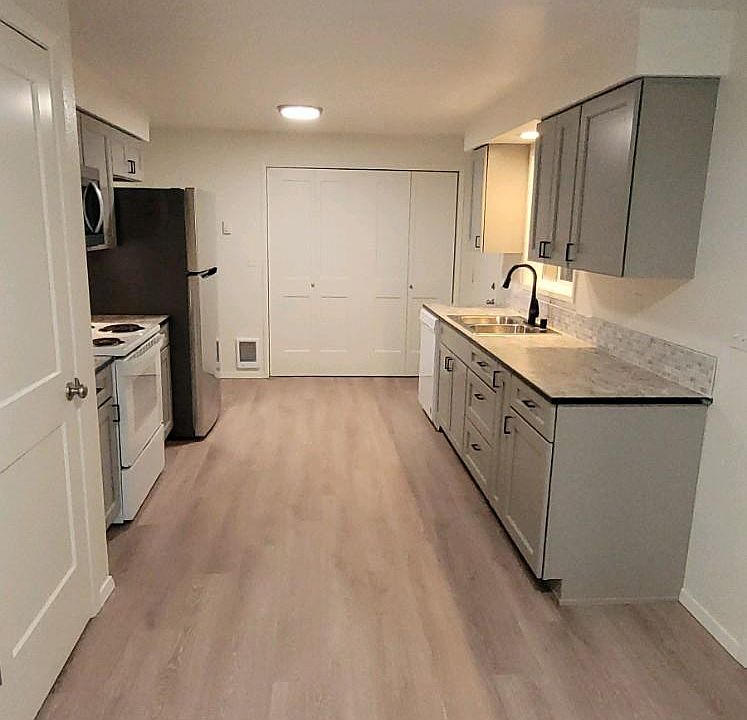 1st image of 3329 E 57th Ave