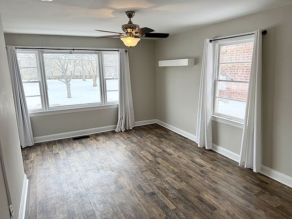 Spacious living room with lots of natural light.