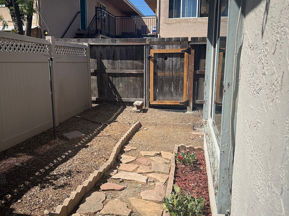 Garden area in front of unit. This private space can be used for plants or as a sitting area with a small table and chairs