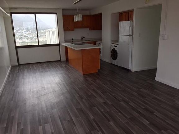 Large kitchen and dining area overlooking the mountains.