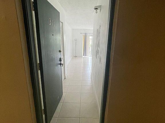 2nd image of 4275 NW South Tamiami Canal Dr APT 311