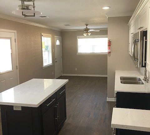 Kitchen and living room area.
