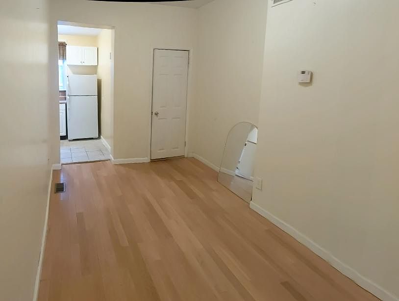 Living room area with beautiful flooring!