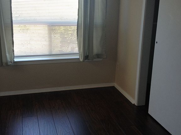 Recently installed flooring on first floor. This is the bed