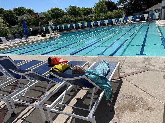 Pool at the Northcrest Swim Club which you would have full access to. It is an Olympic-style pool (50 meters) that extends to 12 feet deep. The deep end has a 1 meter and a 3 meter diving board.