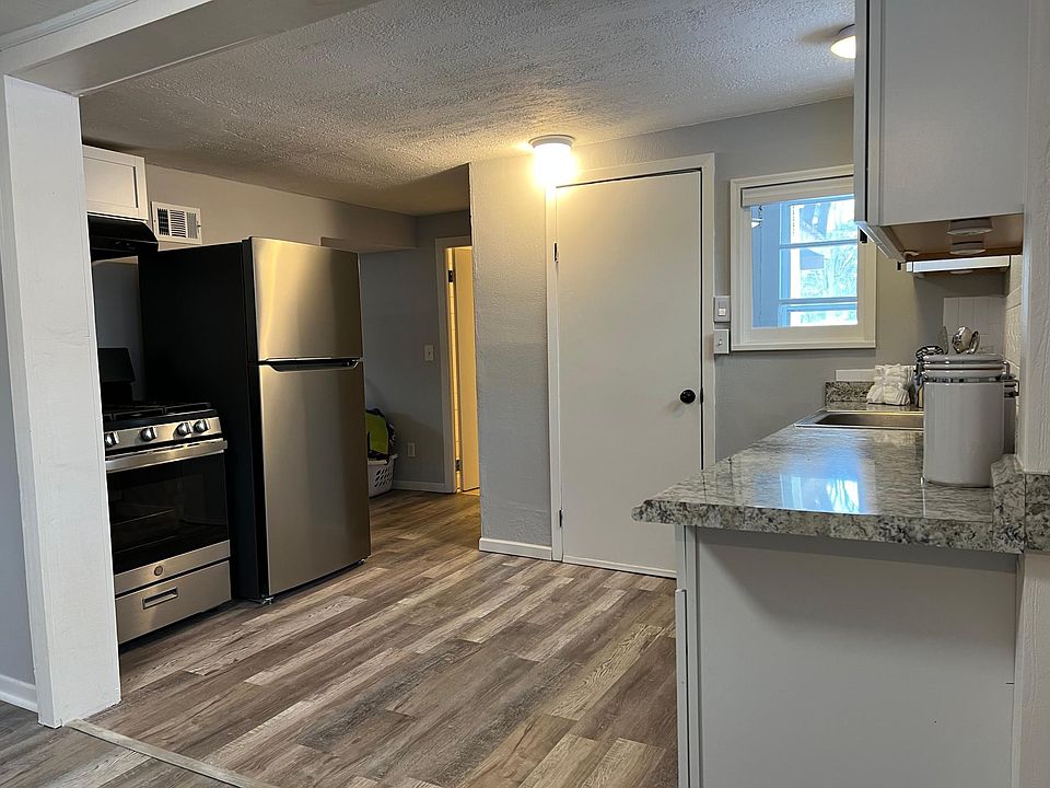 Newly remodeled Kitchen viewed from large dining area. Note: Upgraded stainless allowances.12_x8_