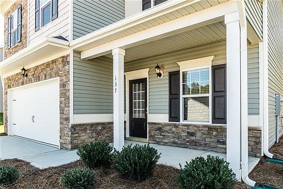 MODEL HOME PICTURE- Beautiful Exteriors with Front Porch!