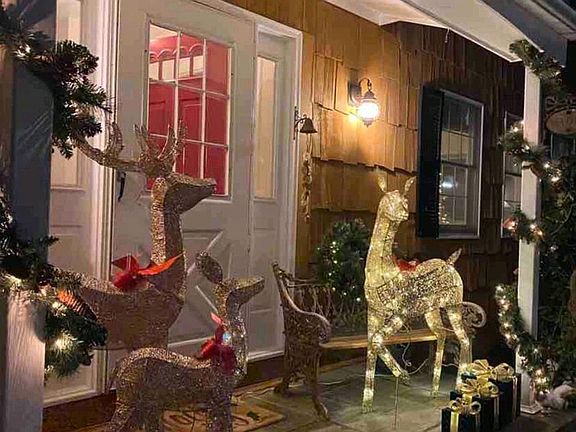 Front porch decorated for the holidays