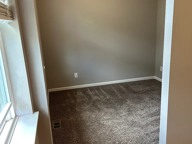 Office/flex space off family room on main level.