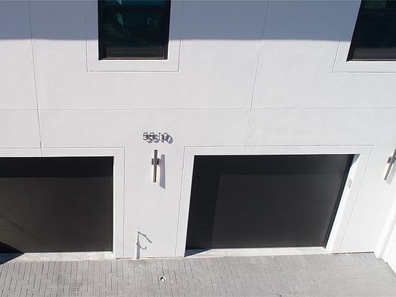 Each bay of garage is private and this unit will have access to the bay on lleft and parking pad in front.