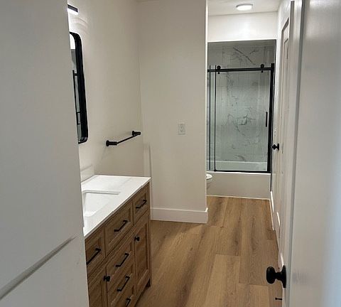 View of large bathroom from Hall entry