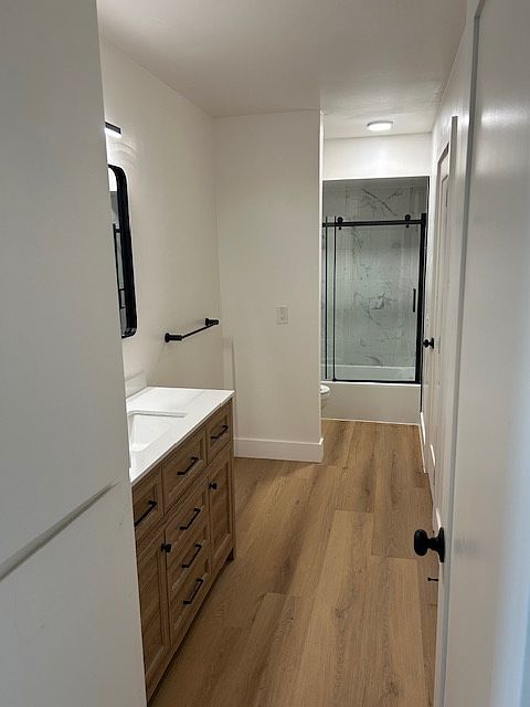 View of large bathroom from Hall entry