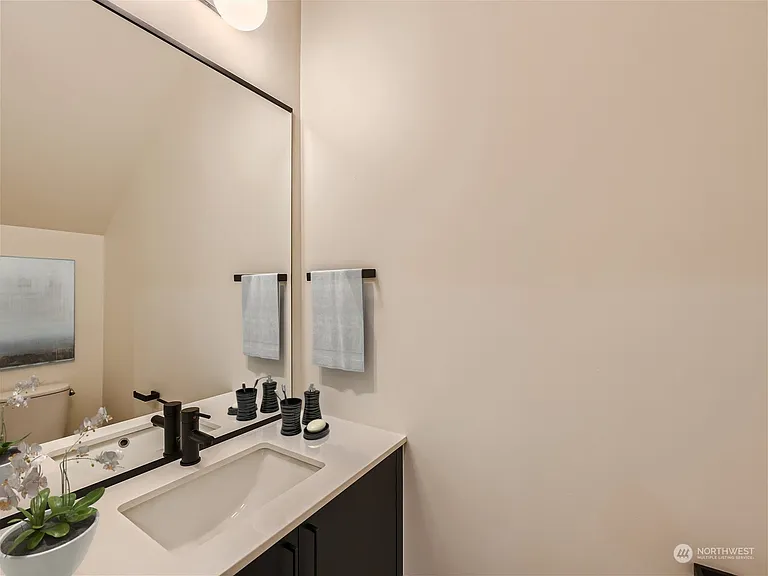 Downstairs bathroom. Spacious half-bath.