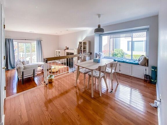 Sun-filled living and dining areas with natural light throughout the day.