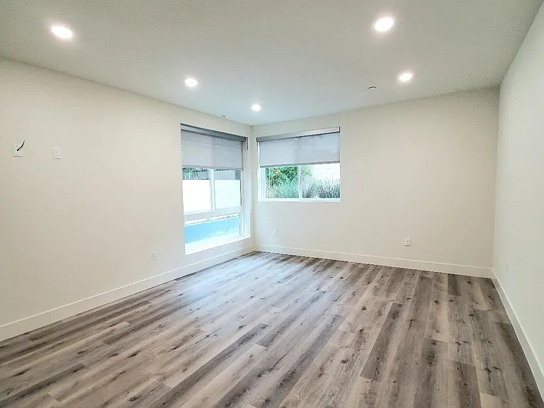 Rear master bedroom with backyard view
