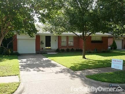 Shaded front with oak and crepe myrtle trees