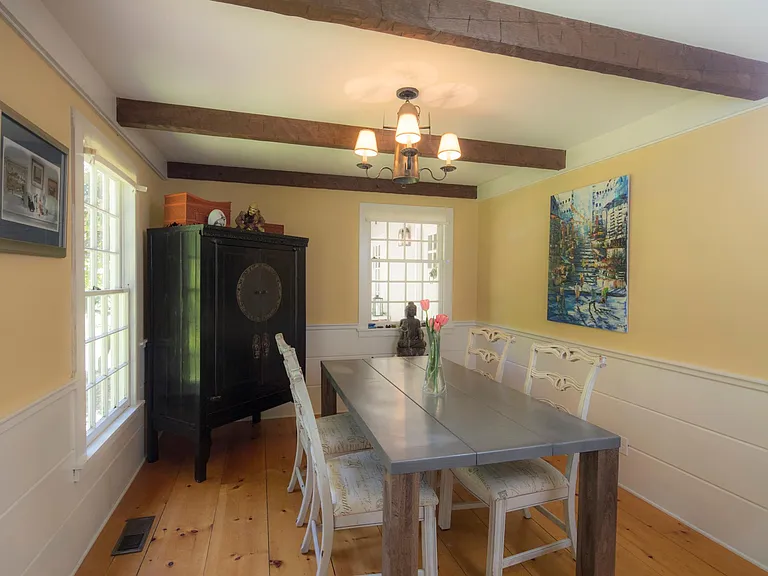 Dining room. Front of house to the left, kitchen to the right.
