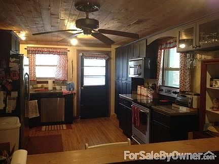 Open Kitchen and Living
						:
						Stainless appliances