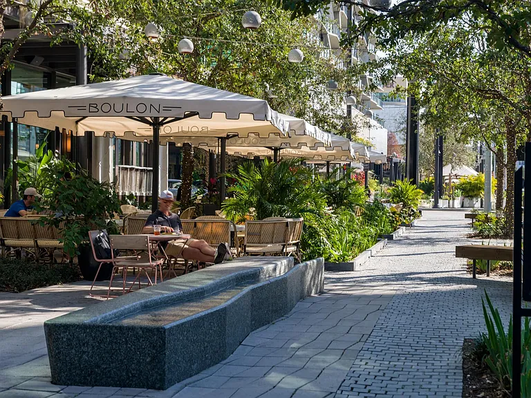 Charming cafes and shaded walkways at Water Street keep Modera Encore close to Tampa's vibrant dining scene and thoughtfully designed outdoor spaces.
