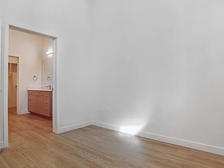 A flexible bedroom space designed for comfort and privacy.