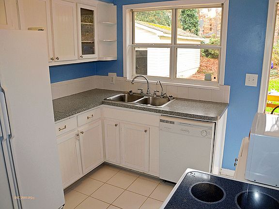 Kitchen includes stacked W/D