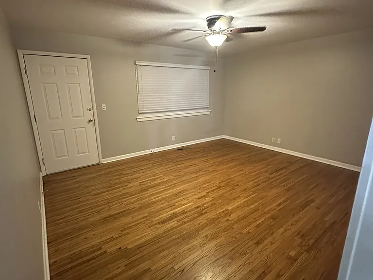 Living Room - Hardwood floors, newer lighting, paint and blinds.