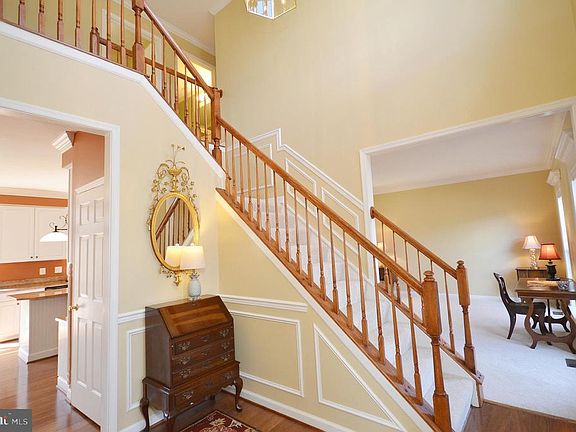 Welcome home to an inviting two story foyer