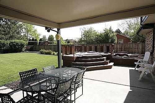 COVERED BACK DECK WITH HOT TUB