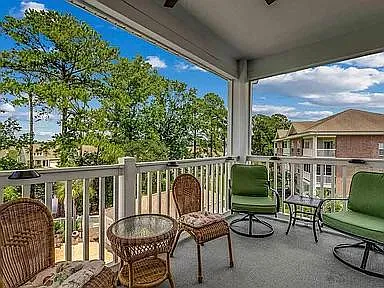 Enjoy morning coffee and evenings on the spacious porch.