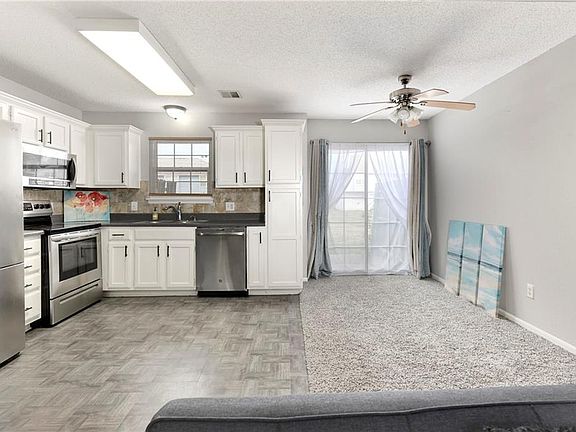 2nd image of 5845 NW Plantation Ln #200-C