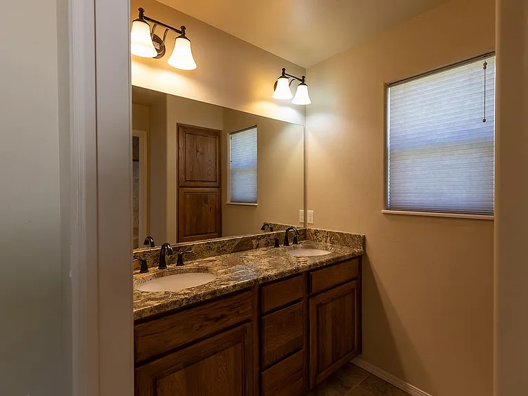 Master bath with double granite vanity