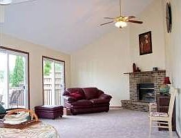 Family Room with vaulted ceiling and fireplace
