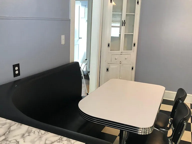 Kitchen with built in booth and hutch