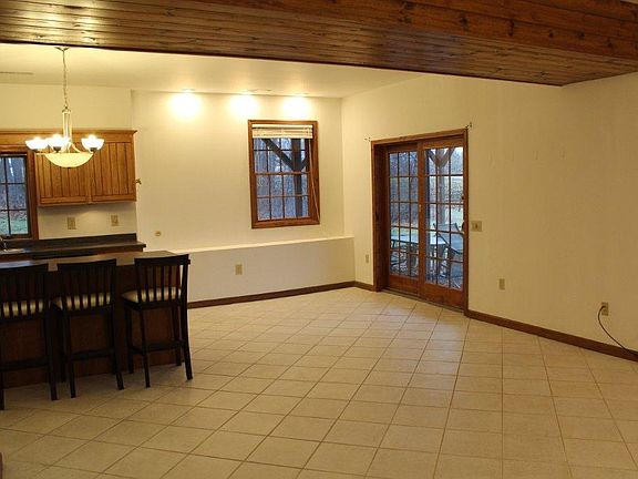 Entrance into living room/kitchen/dining area. Radiant heat under tile.