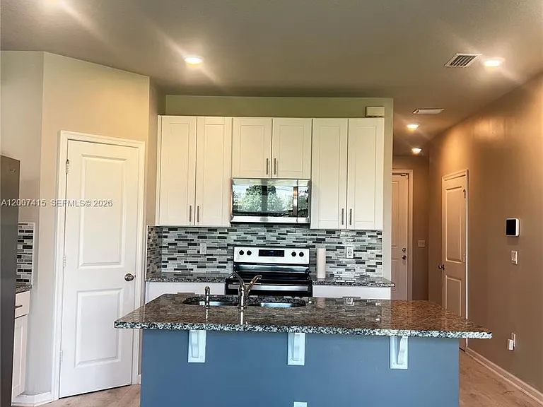 6349 Topsail Dr — Photo 7