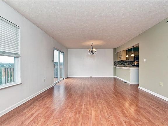 View towards dining room and kitchen from living room