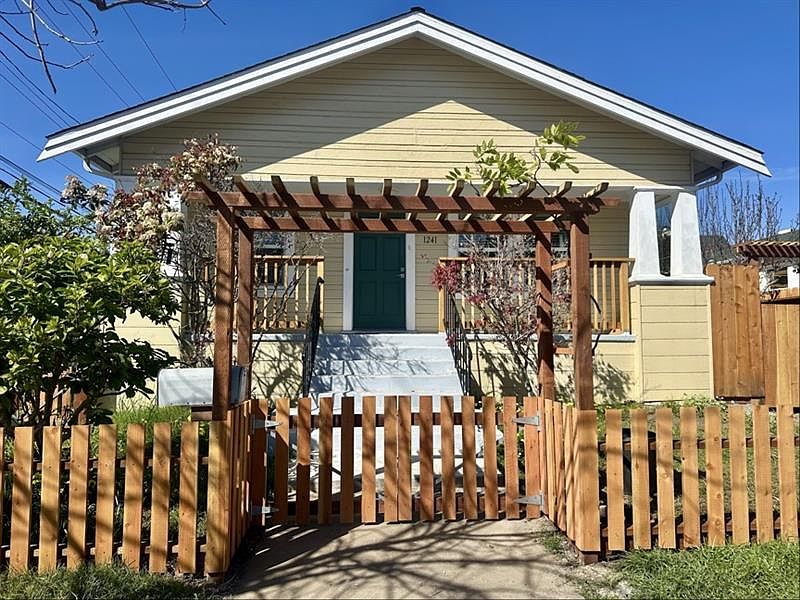 House with fenced in, private front yard
