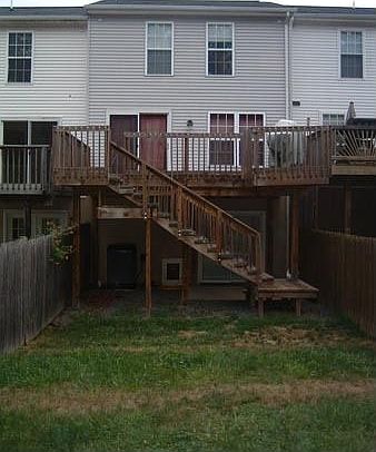 Fenced in Back yard w/ large Deck