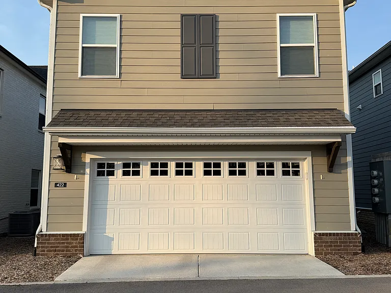 Exterior back - 2 car garage with storage