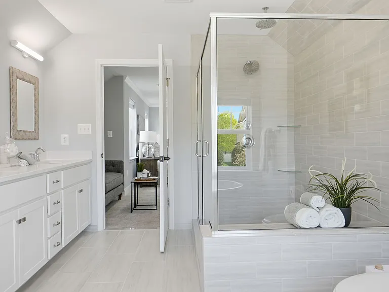 Beautiful en-suite with large shower, soaking tub, and double vanity.