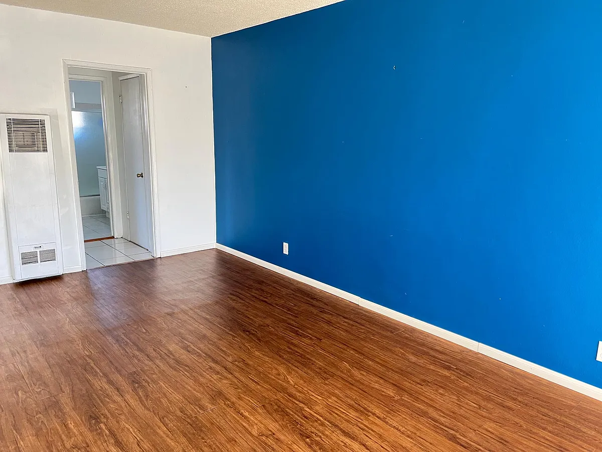 Living room. - 311 W Guinida Ln #A
