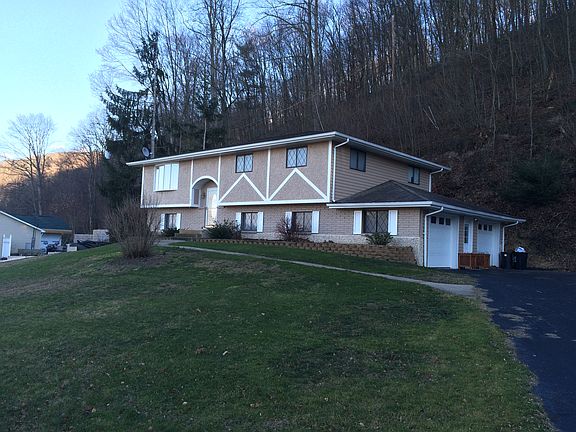 side w/ 2 car garage