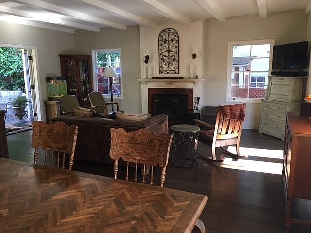 Living room and dining room with french doors on both sides