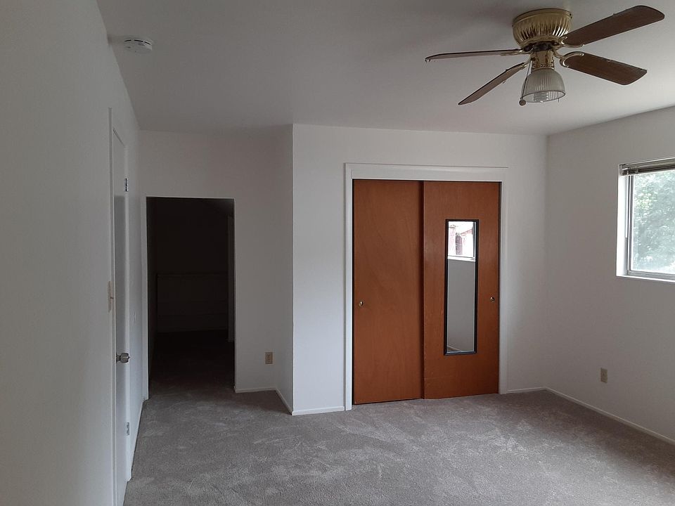 Bedroom, closet and door to walk-in closet.